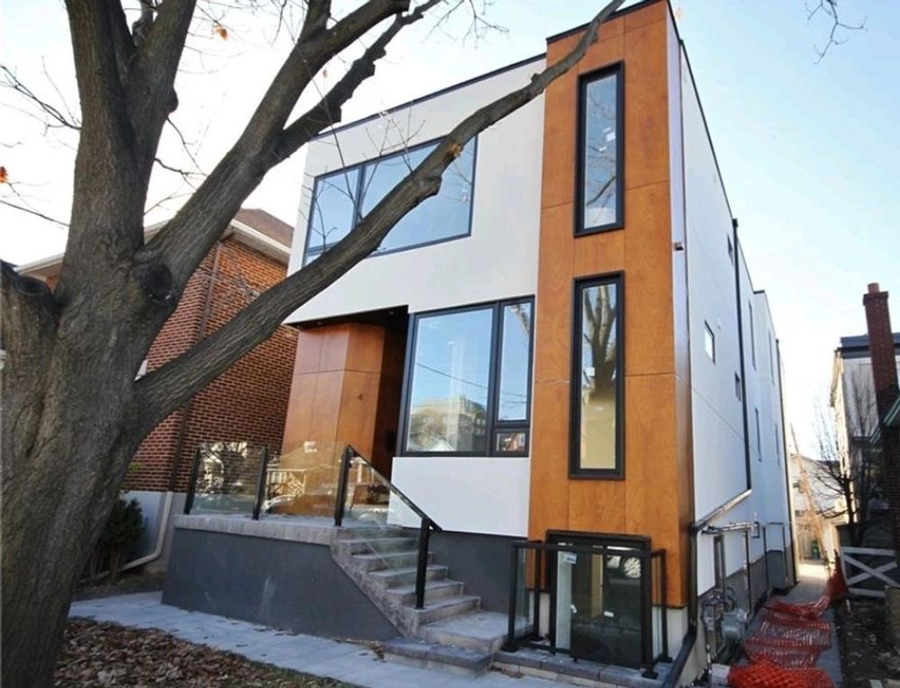 Contemporary Wellington residential building with wood and white exterior
